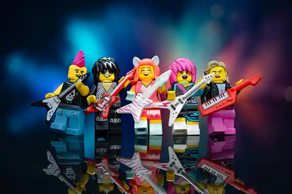 LEGO punk and glam rock minifigures holding guitars and a keytar in a concert-style setup.
