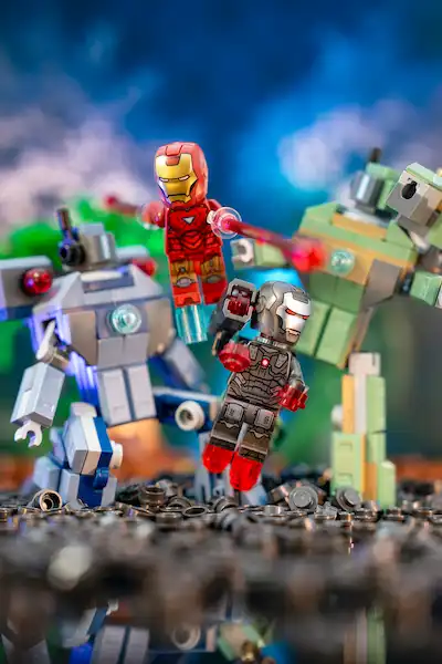 LEGO Iron Man and War Machine team up mid-air, blasting drones in a reimagined Iron Man 2 finale.