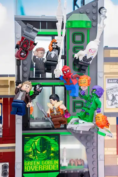 LEGO Spider-Verse heroes clash with villains at Oscorp in an action-packed rooftop battle.