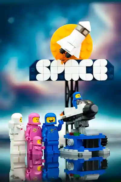 A group of LEGO astronauts and aliens ride a futuristic space hovercraft through a neon-lit asteroid field, with planets and comets streaking by in the background.